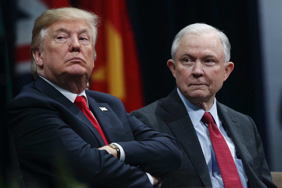 President Donald Trump sits with Attorney General Jeff Sessions during the FBI National Academy graduation ceremony in Quantico, Va. Dec. 15, 2017 (AP Photo/Evan Vucci, File)