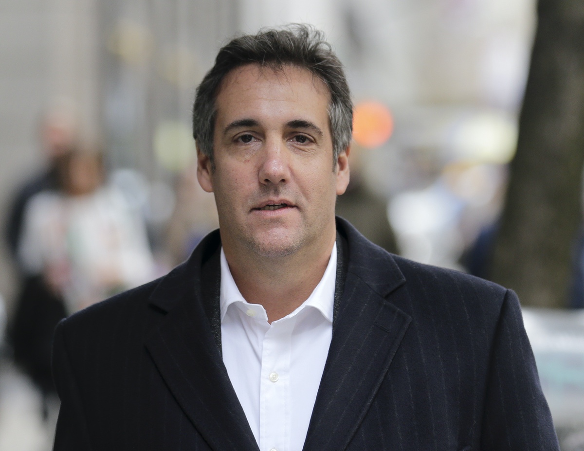 Michael Cohen, President Donald Trump's personal attorney, walks down the sidewalk in New York, Wednesday, April 11, 2018. (AP Photo/Seth Wenig)