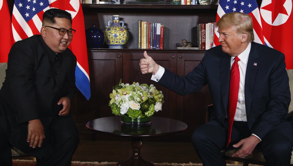 President Donald Trump meets with North Korean leader Kim Jong Un on Sentosa Island, Tuesday, June 12, 2018, in Singapore. (AP Photo/Evan Vucci)