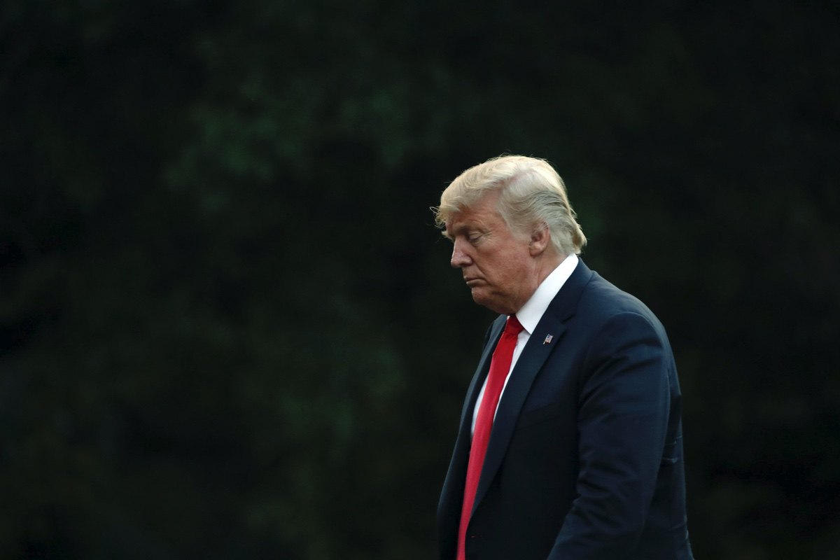 President Donald Trump walks on the South Lawn of the White House after stepping off Marine One, Thursday, July 26, 2018, in Washington. (AP Photo/Alex Brandon)