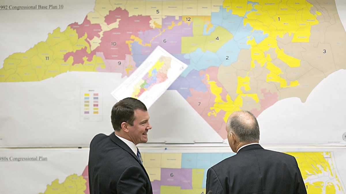 State Senators Dan Soucek, left, and Brent Jackson, right, review historical maps during The Senate Redistricting Committee for the 2016 Extra Session in the Legislative Office Building at the N.C. General Assembly on Tuesday Tuesday, Feb. 16, 2016, in Raleigh, N.C. (Corey Lowenstein/The News & Observer via AP)